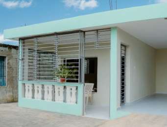 Banco Popular y FACCI entregan vivienda a ni�a con c�ncer en Santo Domingo Este